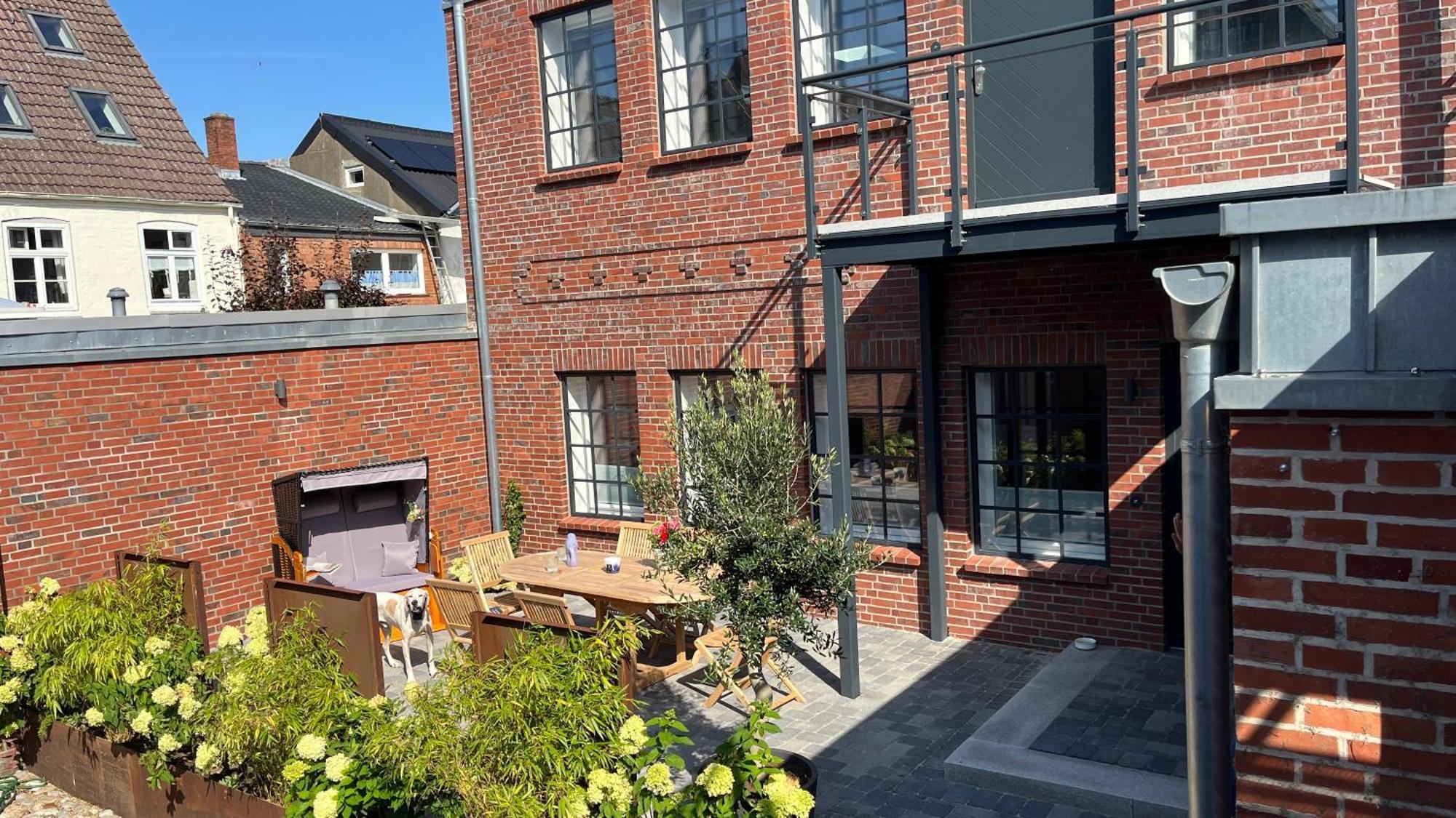 Loftwohnung 2 Simmerdeis An Der Gracht Friedrichstadt Esterno foto